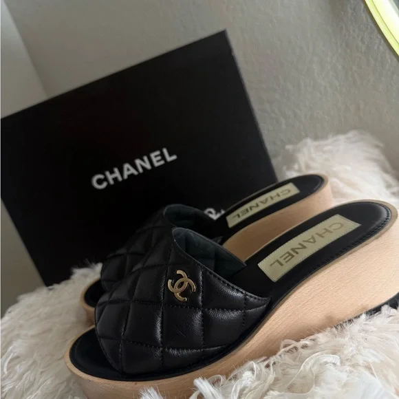 CHANEL Black and Tan Quilted Mules